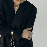 Ketting met leopardprint en bedel