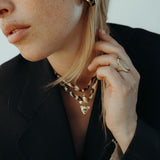 Goudkleurige teardrop-oorbellen met tijgerprint