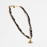 Ketting met leopardprint en hartjes bedel
