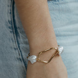 Schakelarmband met parel